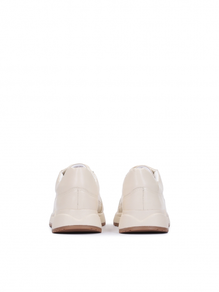 Skórzane sneakersy damskie off-white o komfortowej konstrukcji