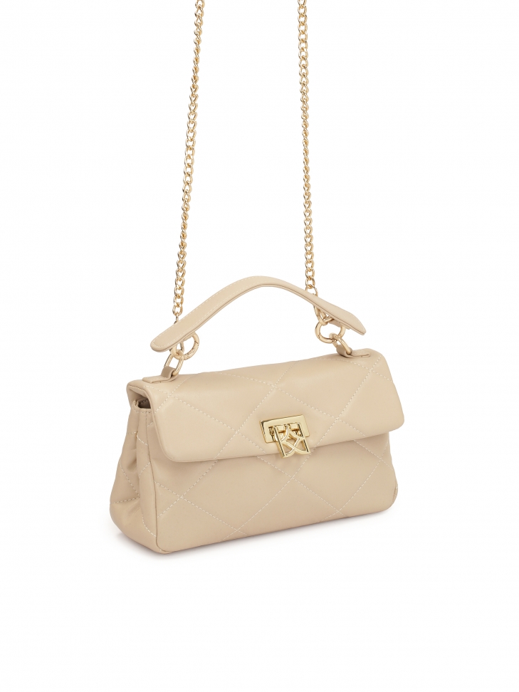 Pikowana torebka z odpinaną rączką