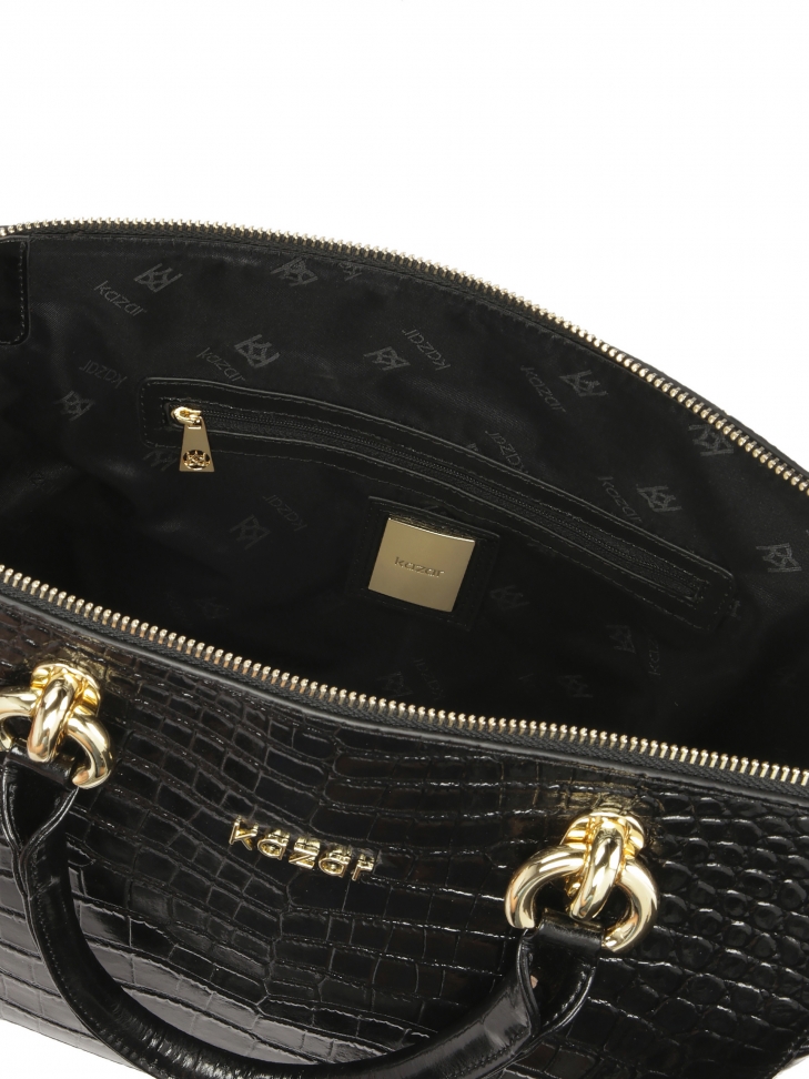 Elegancka skórzana torebka w tłoczony wzór oko