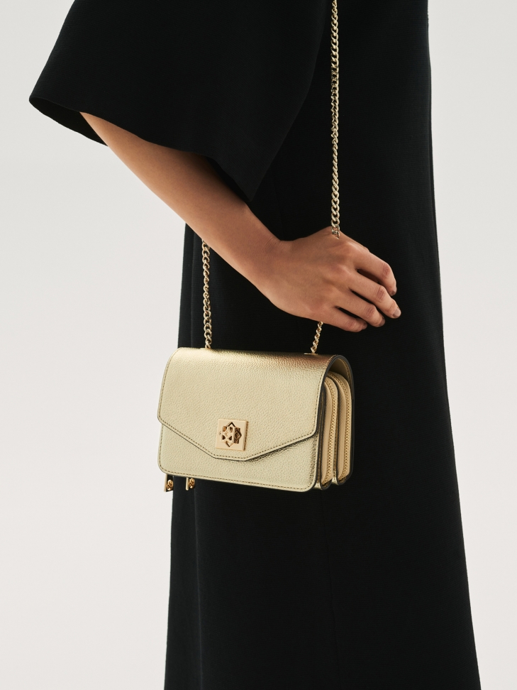 Złota torebka damska