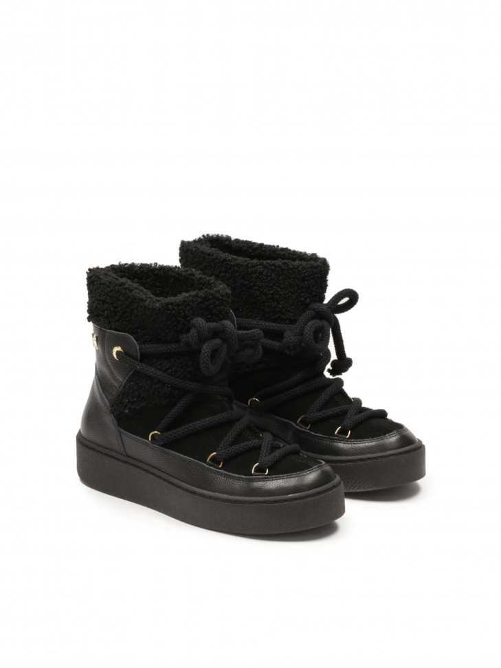 Czarne śniegowce z łączonych materiałów