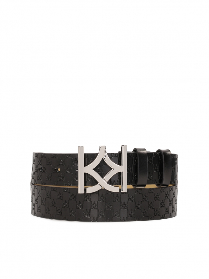 Czarny pasek damski z ozdobną srebrną klamrą