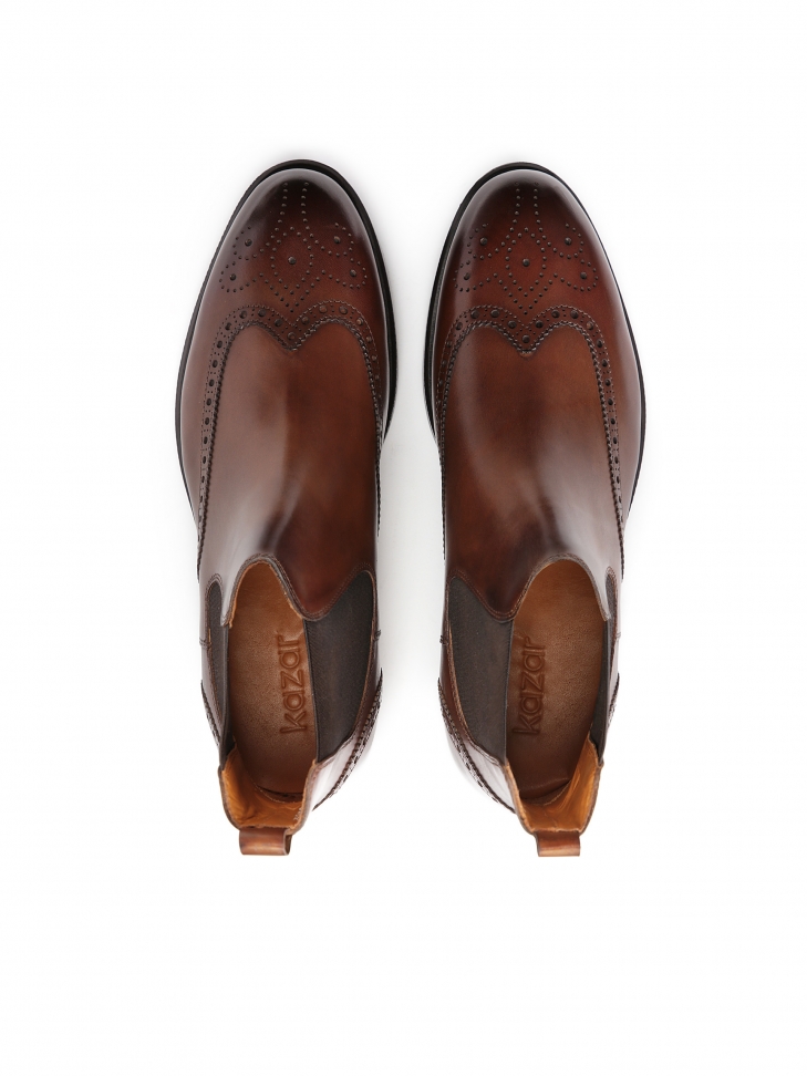 Modne skórzane sztyblety męskie zdobione ażurowym wzorem