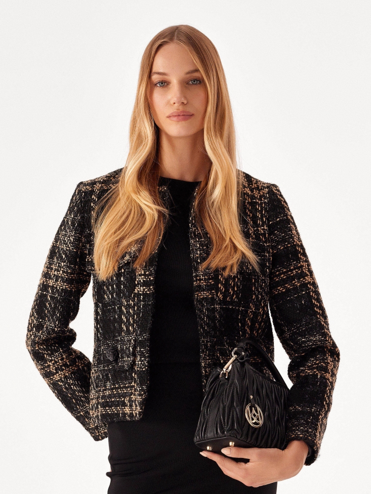 Skórzana torebka z finezyjnym pikowaniem