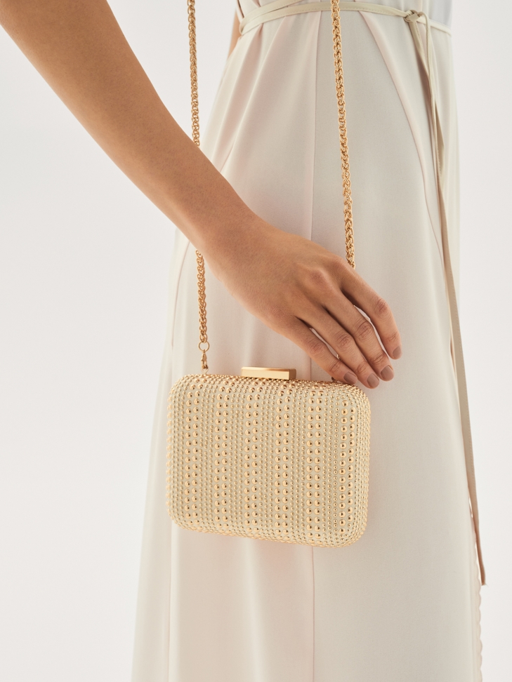 Złota kopertówka damska