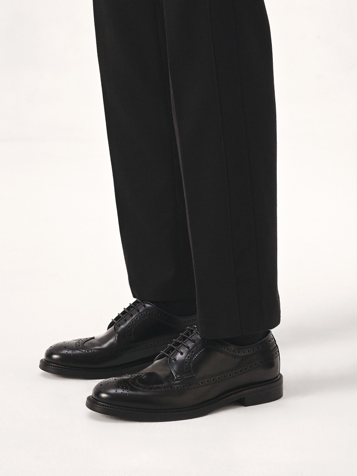 Czarne brogsy na skórzanej podeszwie