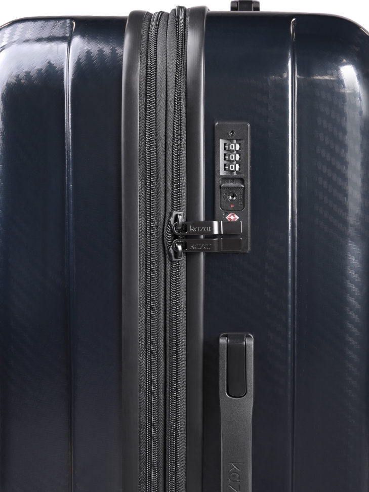 Duża granatowa walizka podróżna z tłoczeniem
