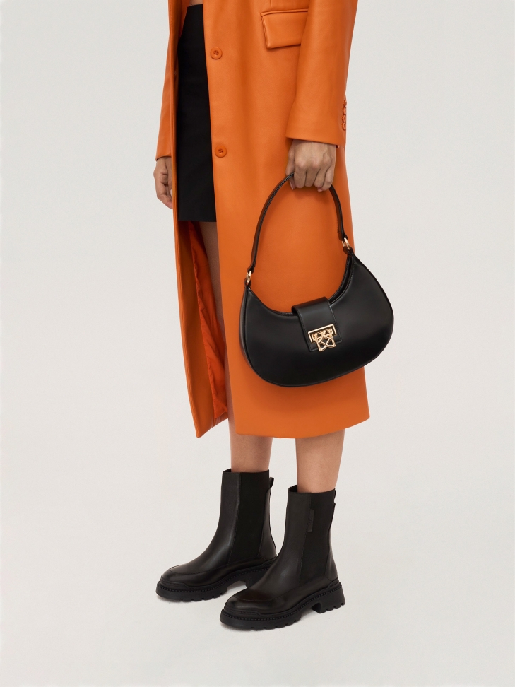 Skórzane botki typu chelsea na grubej futurystycznej podeszwie