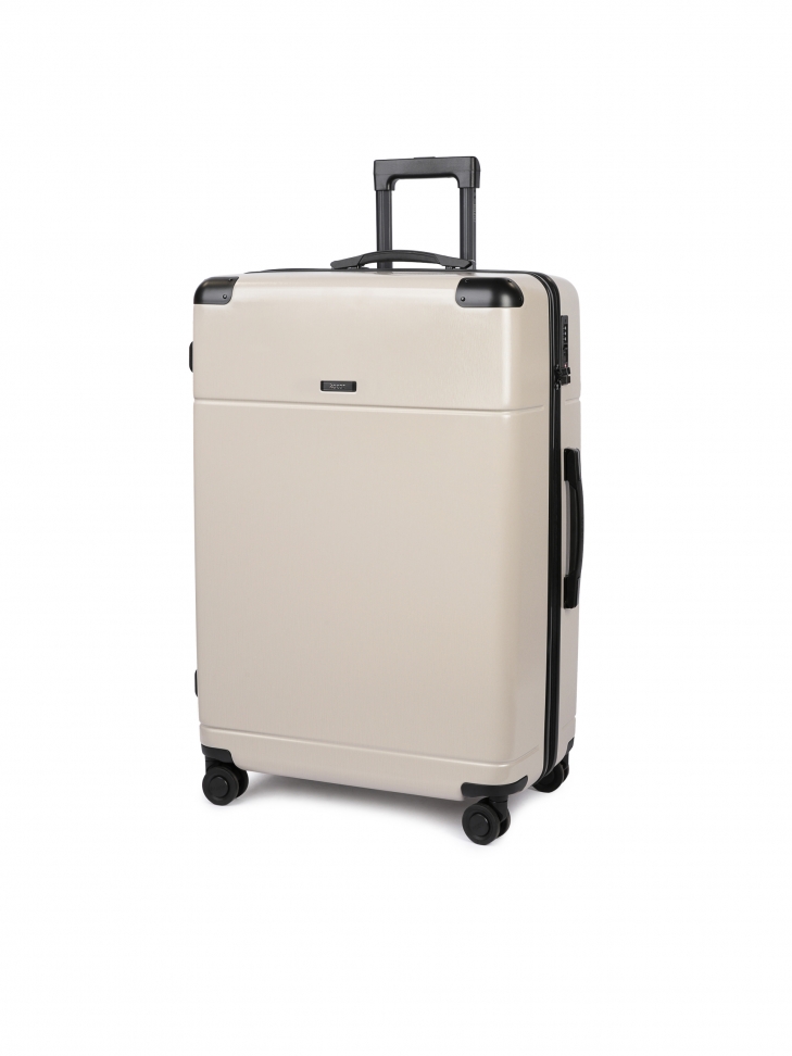Duża beżowa walizka PC na zwrotnych kółkach