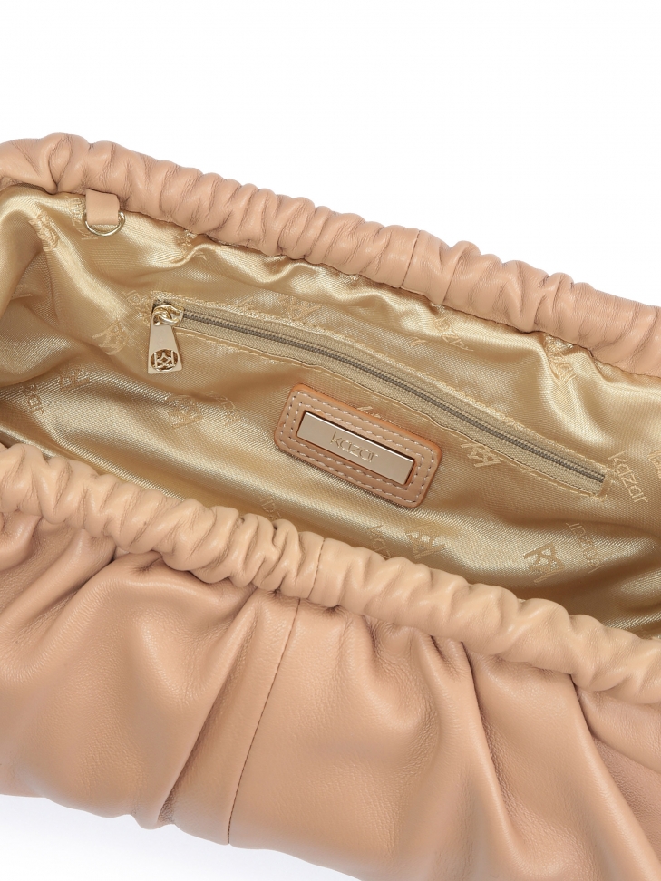 Efektowna skórzana torebka z metalową ramą