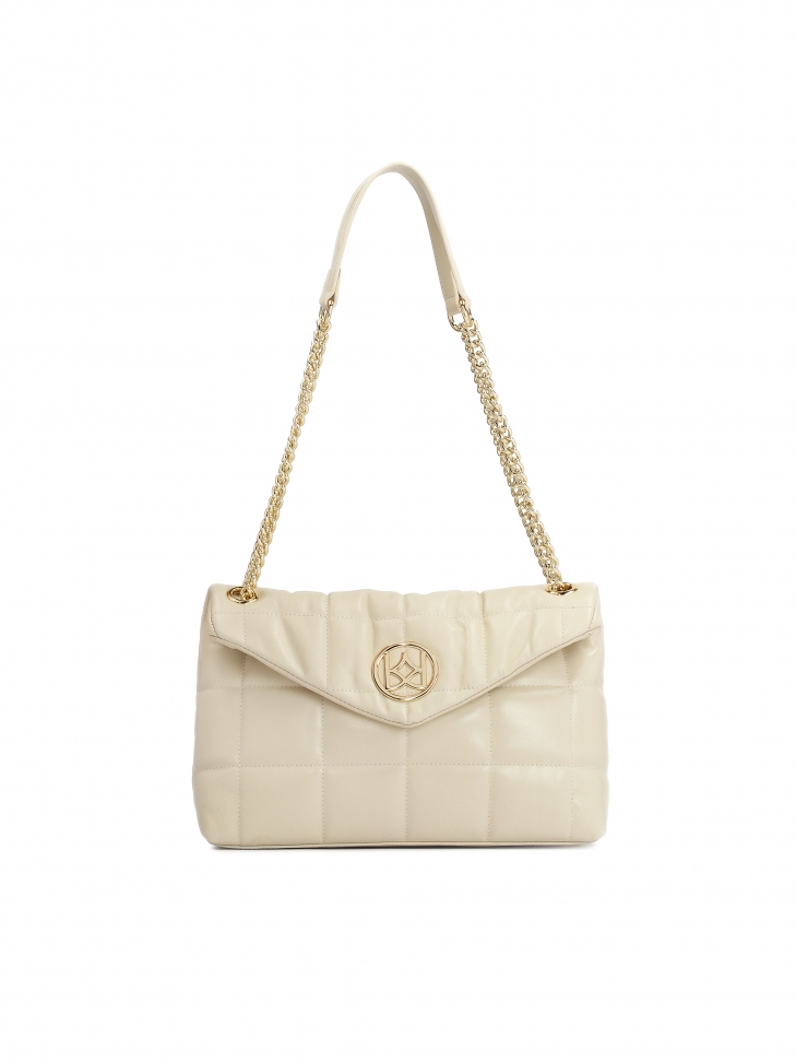 Skórzana torebka na łańcuchu zdobiona pikowaniem