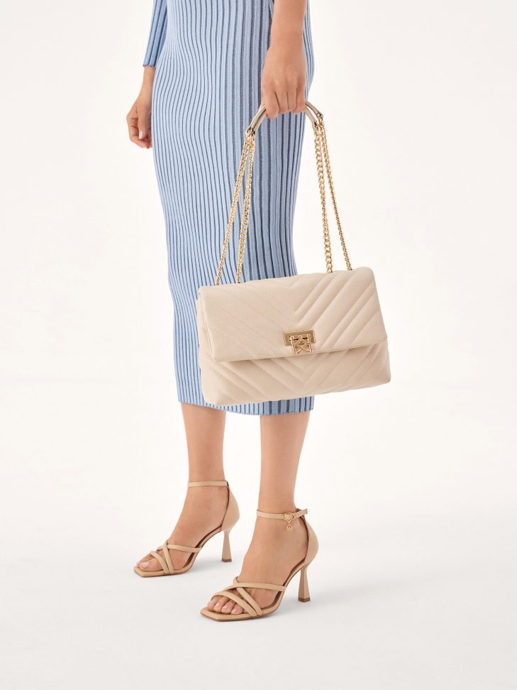 Pikowana torebka z klapą