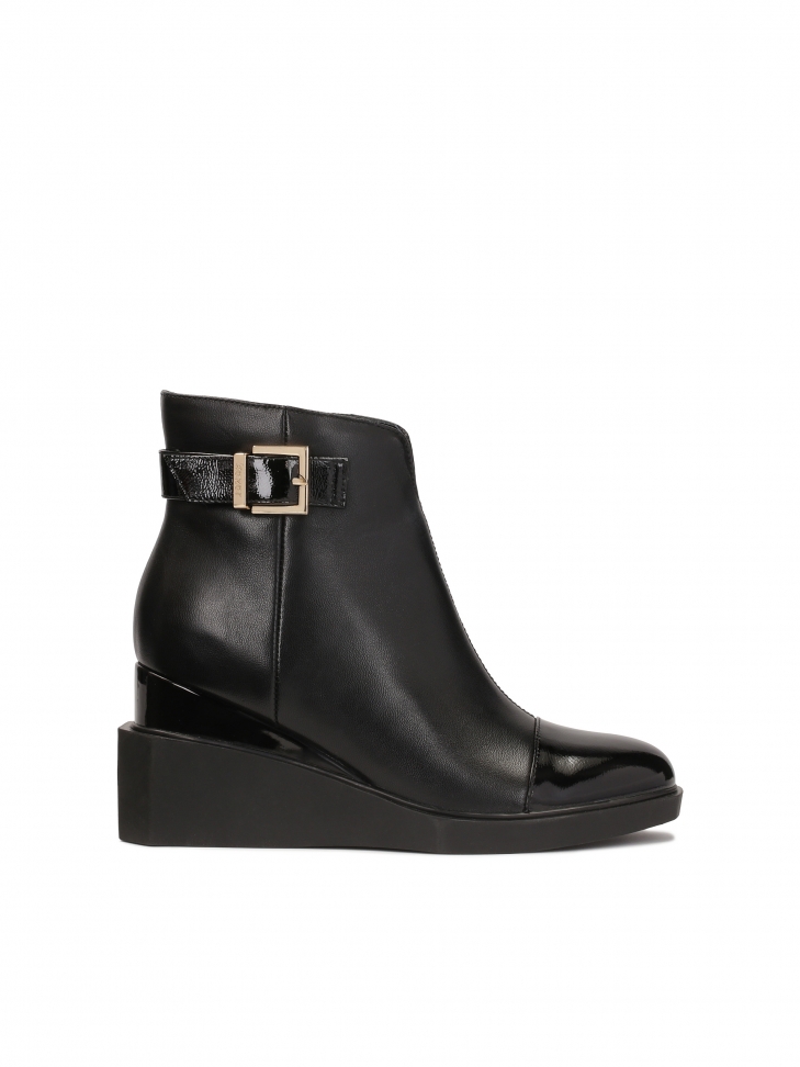 Skórzane botki na dwupoziomowym koturnie