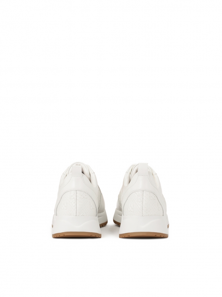 Białe sneakersy w monogramy z łączonych skór