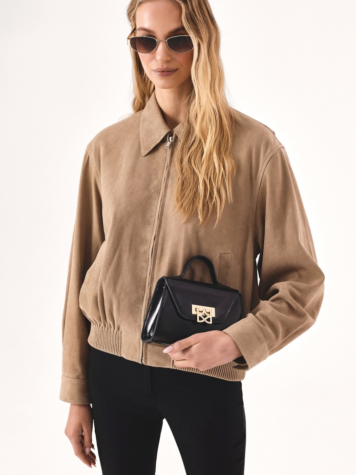 Elegancka lakierowana torebka z rączką