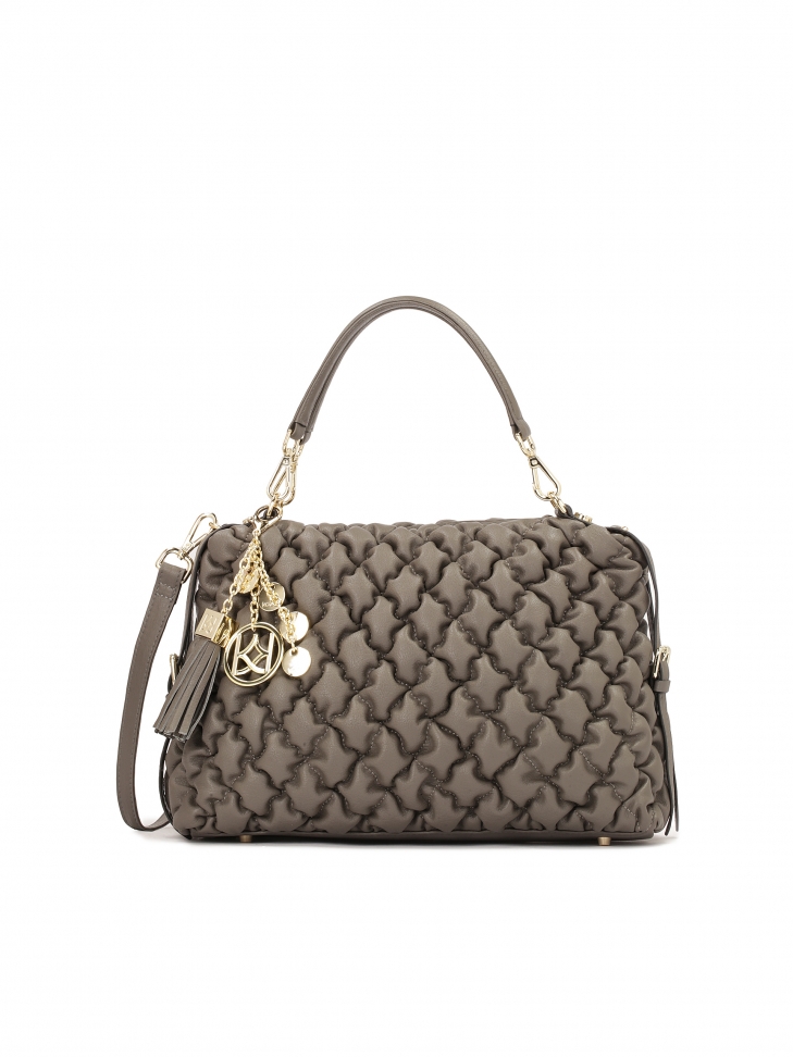 Skórzana torebka z uchwytami zdobiona modnym przeszyciem