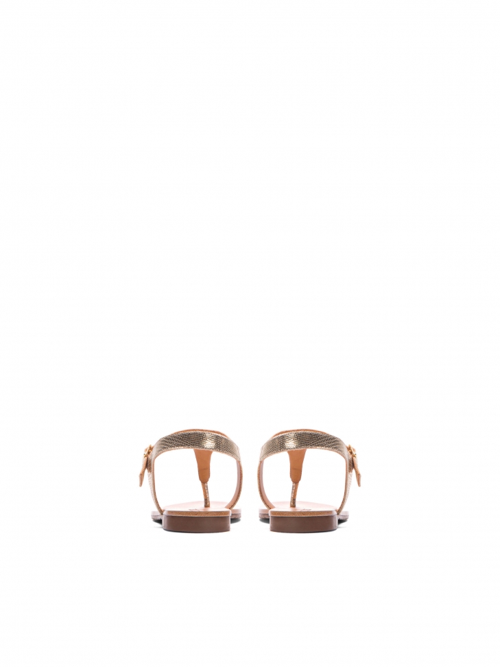 Złote sandały typu japonki z tłoczonej skóry