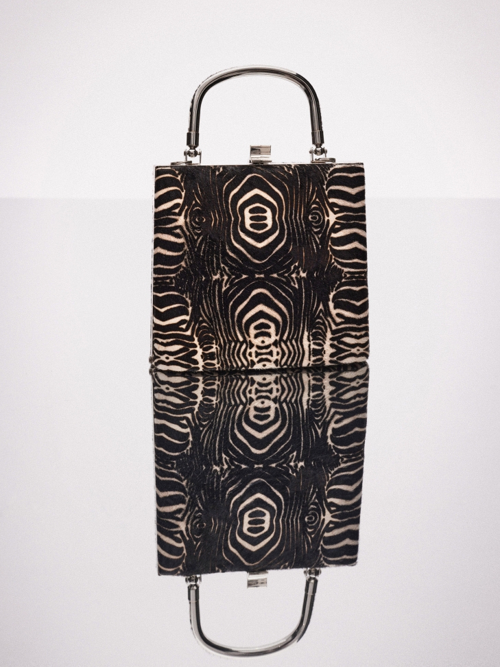 Okazjonalna torebka w finezyjny wzór zebry