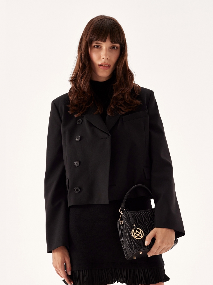 Skórzana torebka z finezyjnym pikowaniem