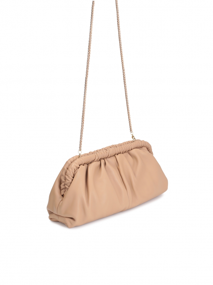 Efektowna skórzana torebka z metalową ramą