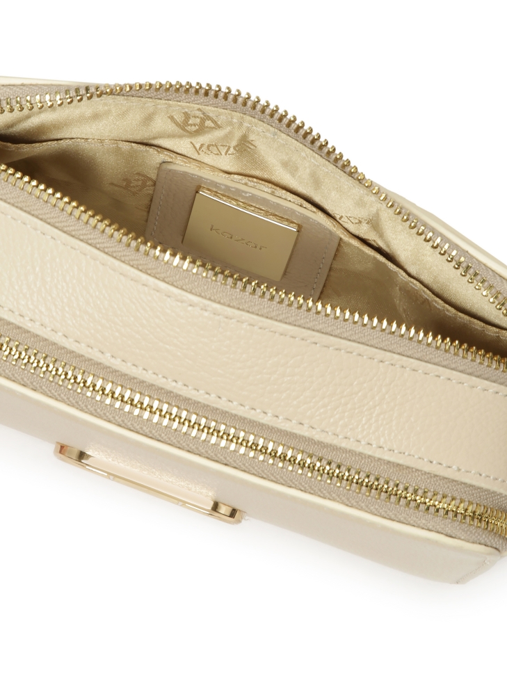 Skórzana torebka z dwoma odpinanymi paskami