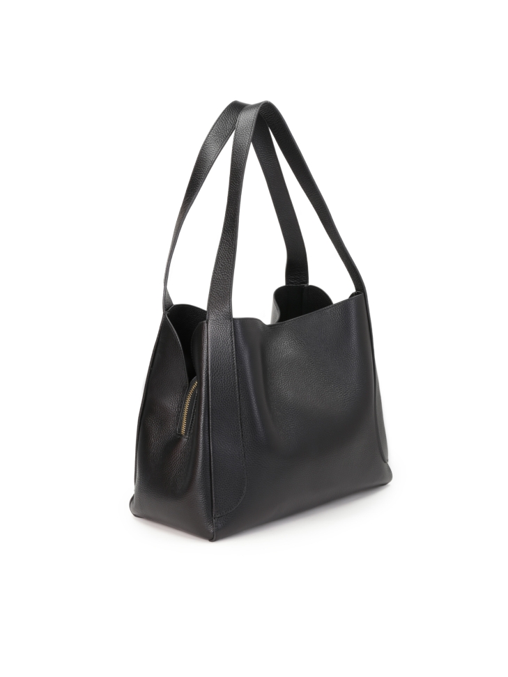 Skórzana torebka damska o unikatowym kształcie