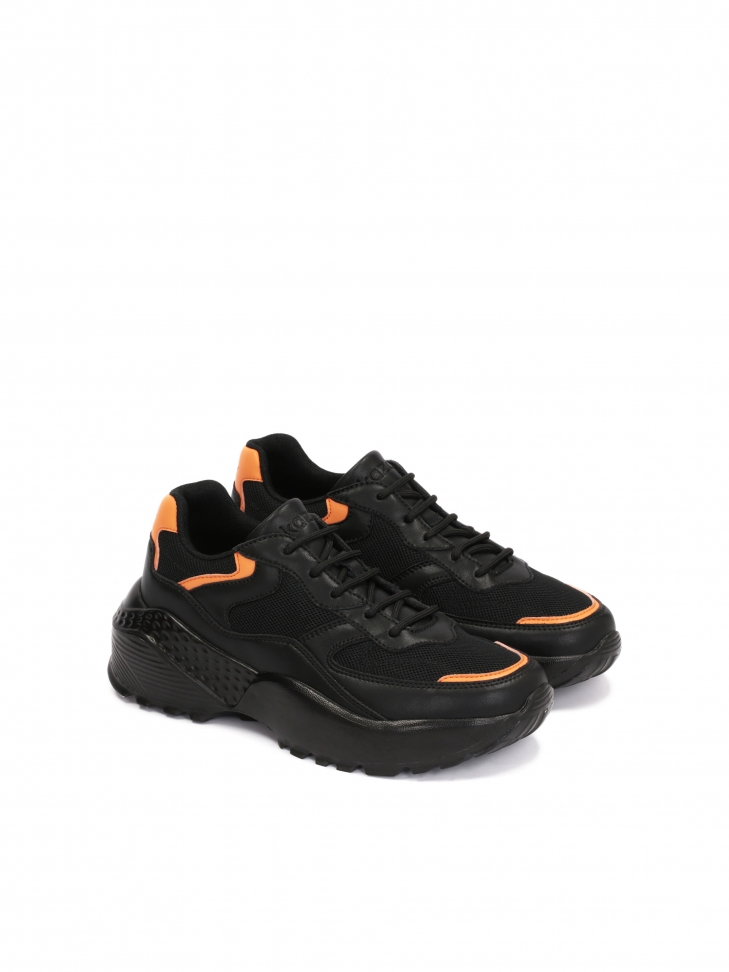 Czarne awangardowe sneakersy damskie z pomarańczowymi wstawkami