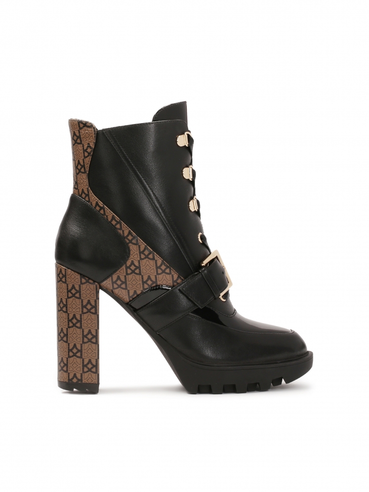 Wzorzyste skórzane botki na wysokim słupku i grubej podeszwie