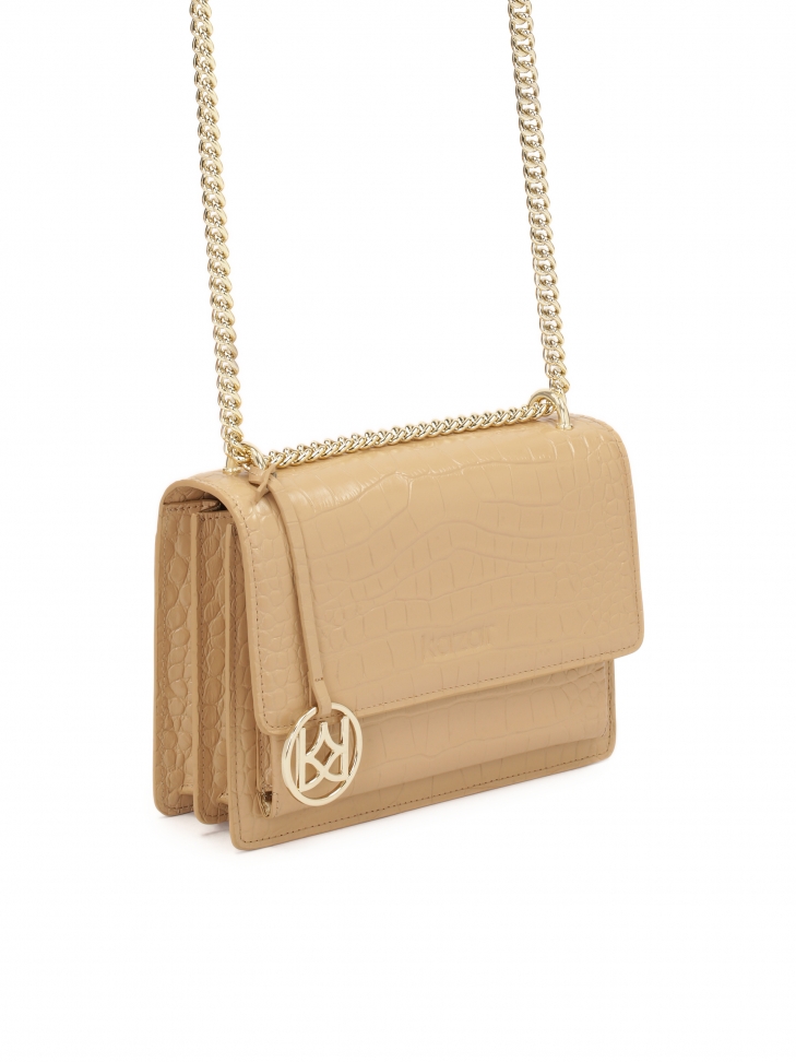 Mała torebka w tłoczony wzór oko