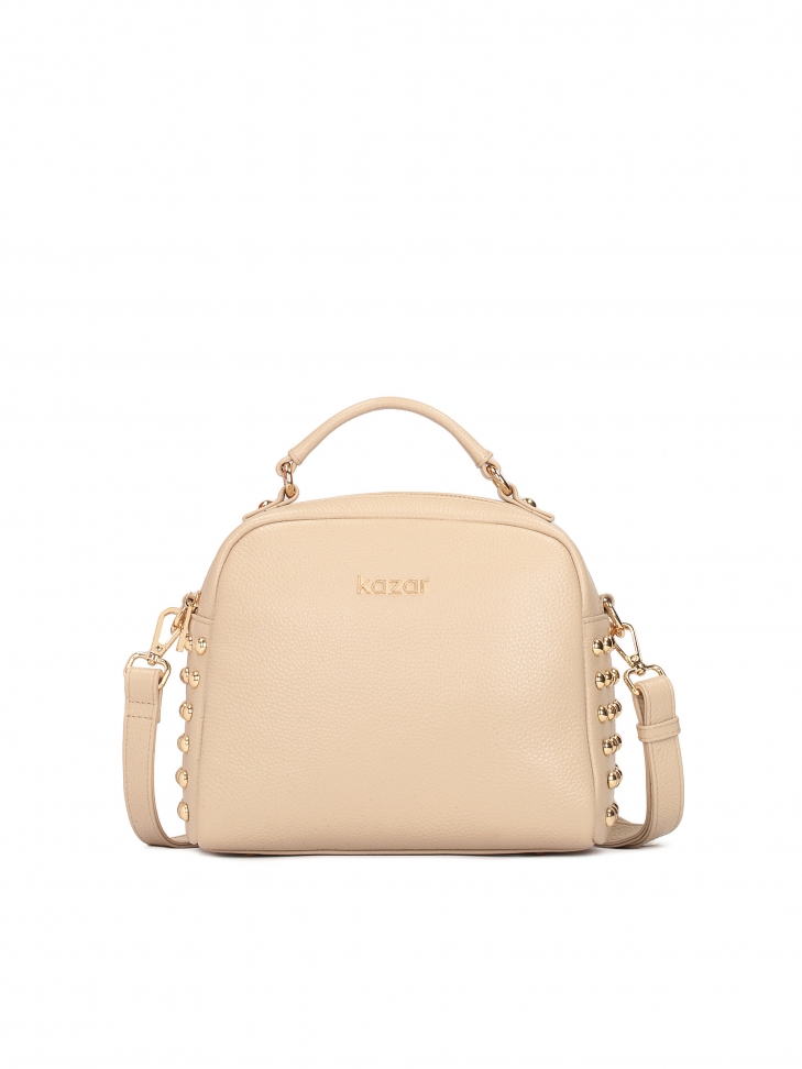 Torebka ze skóry zdobiona nitami