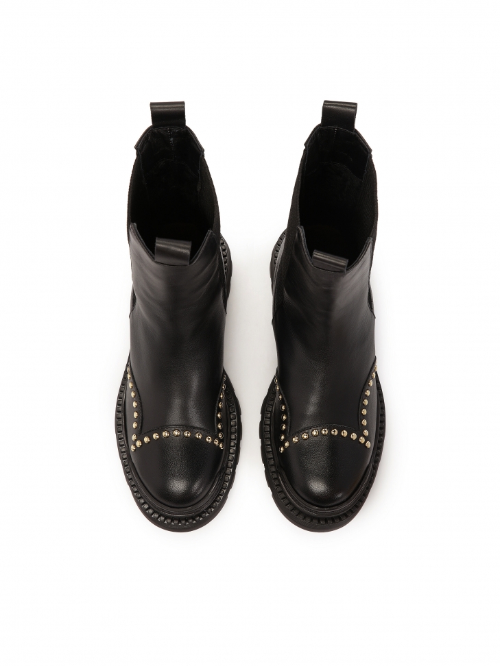 Botki z wsuwaną cholewką zdobioną oągłymi nitami