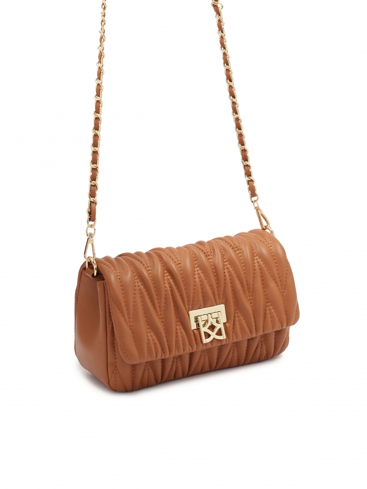 Brązowa torebka z finezyjnie pikowanej skóry