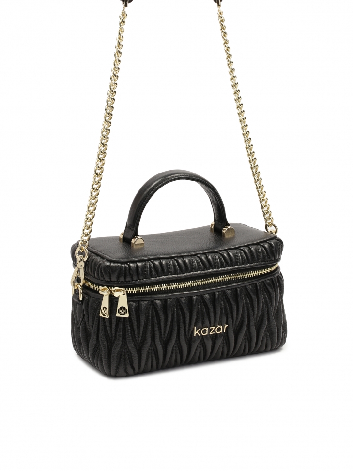 Pikowana torebka w kształcie kuferka