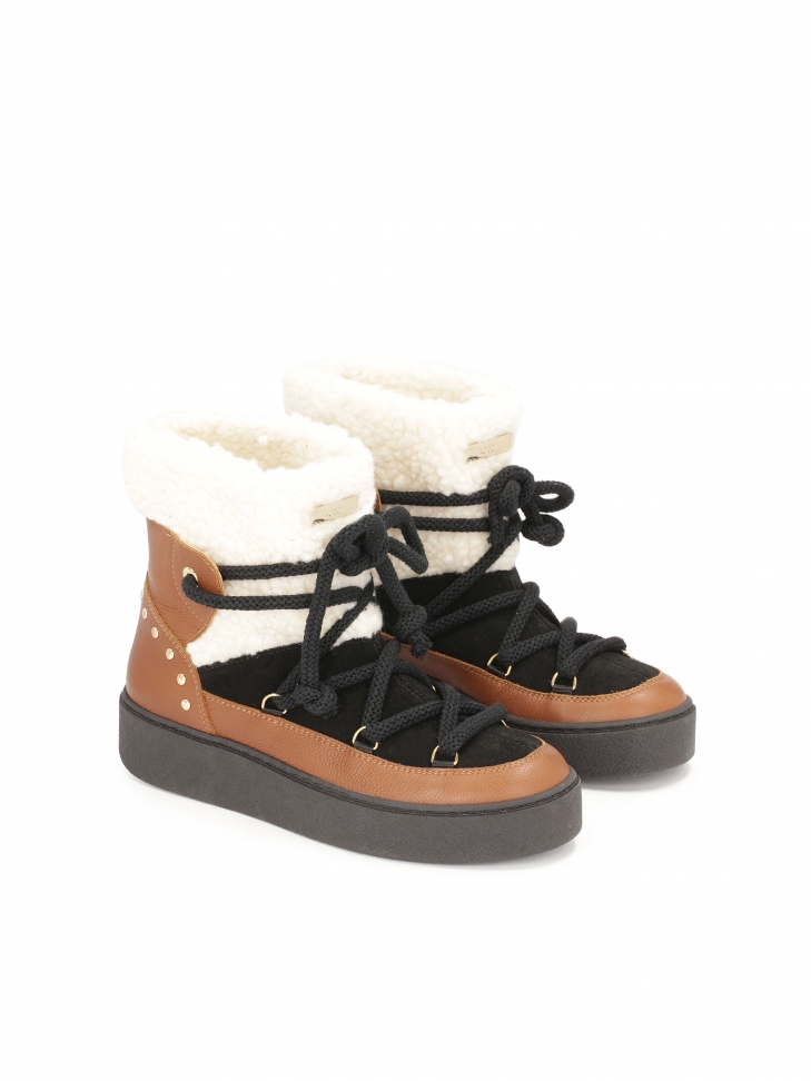 Kolorowe śniegowce z łączonych materiałów