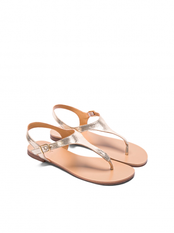 Złote sandały typu japonki z tłoczonej skóry