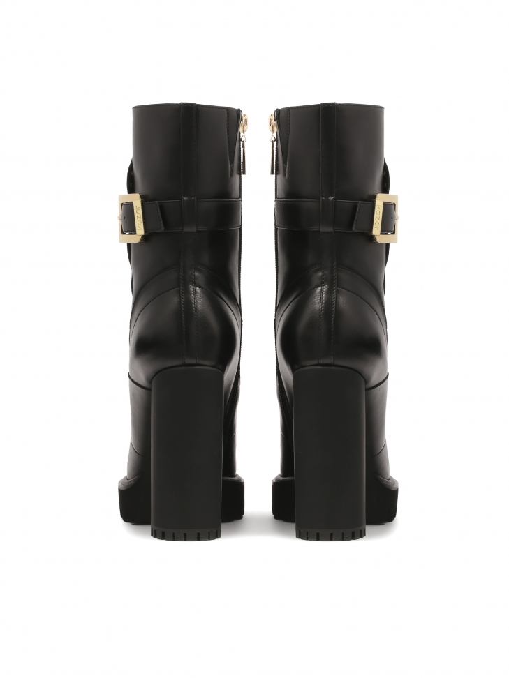 Czarne botki z oągłymi otymi nitami