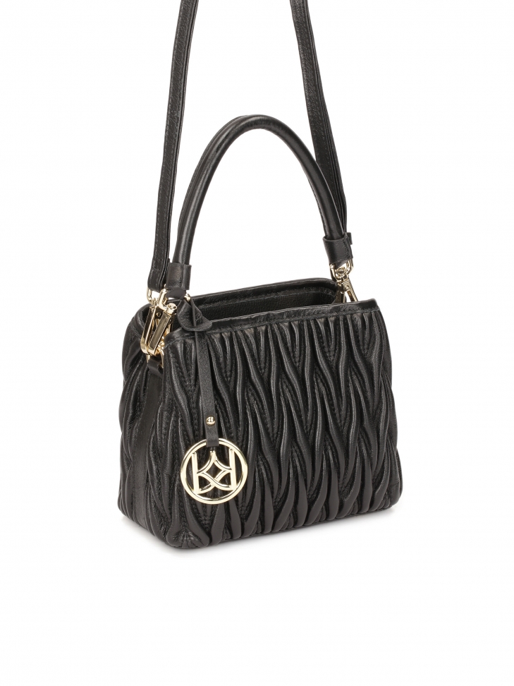 Skórzana torebka z finezyjnym pikowaniem