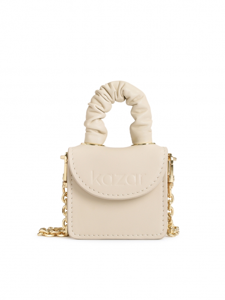 Beżowa mini torebka skórzana do ręki i na ramię