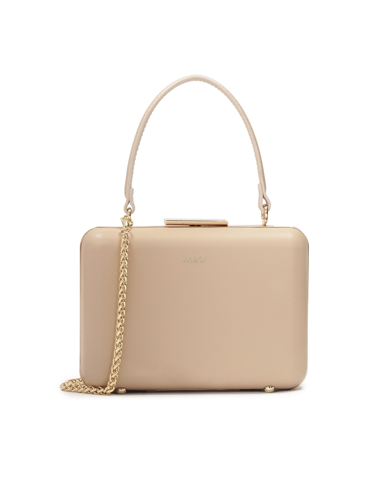 Sztywna torebka puzderko poyta skórą