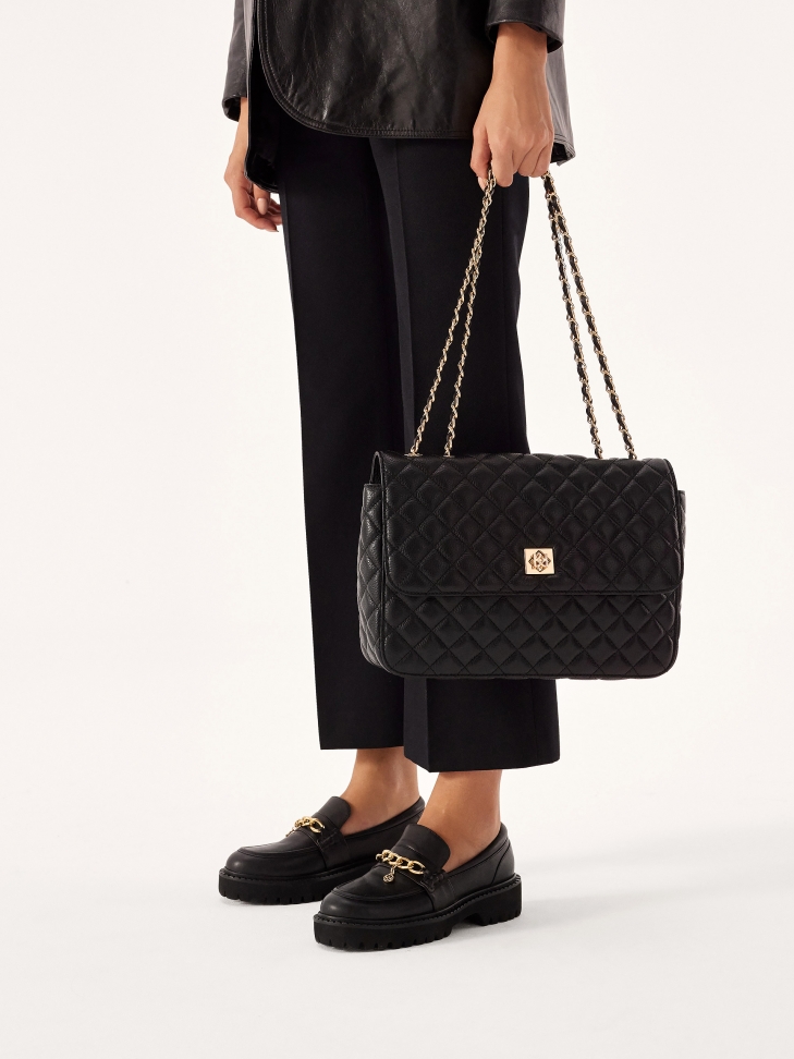 Skórzana czarna torebka na ramię w pikowany wzór