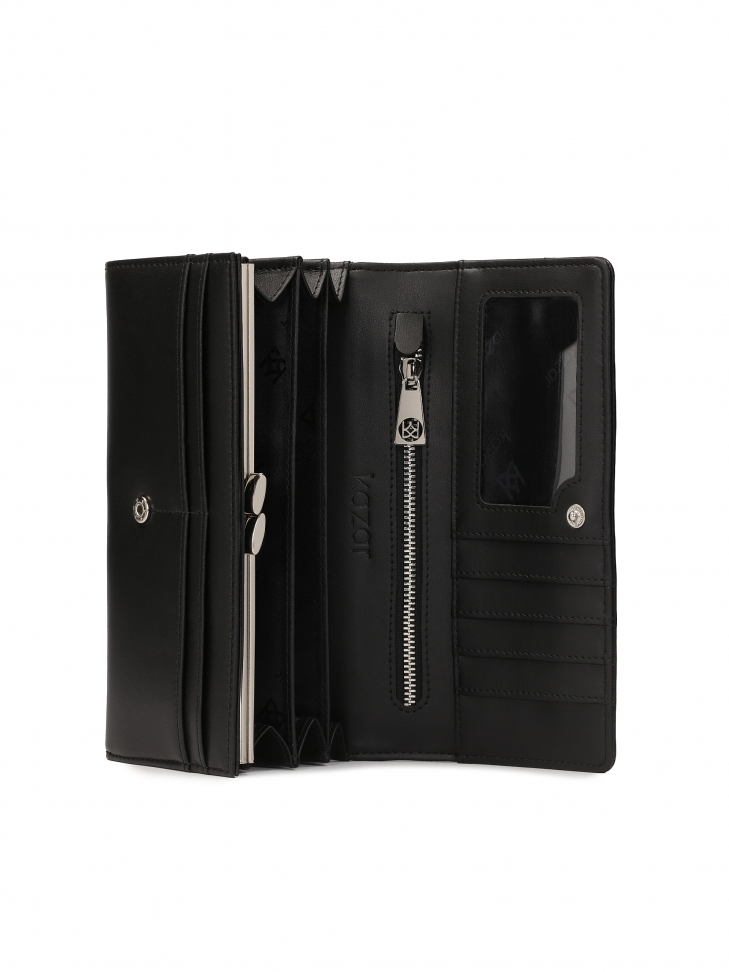 Duży portfel ze skóry ozdobiony srebrnymi dżetami