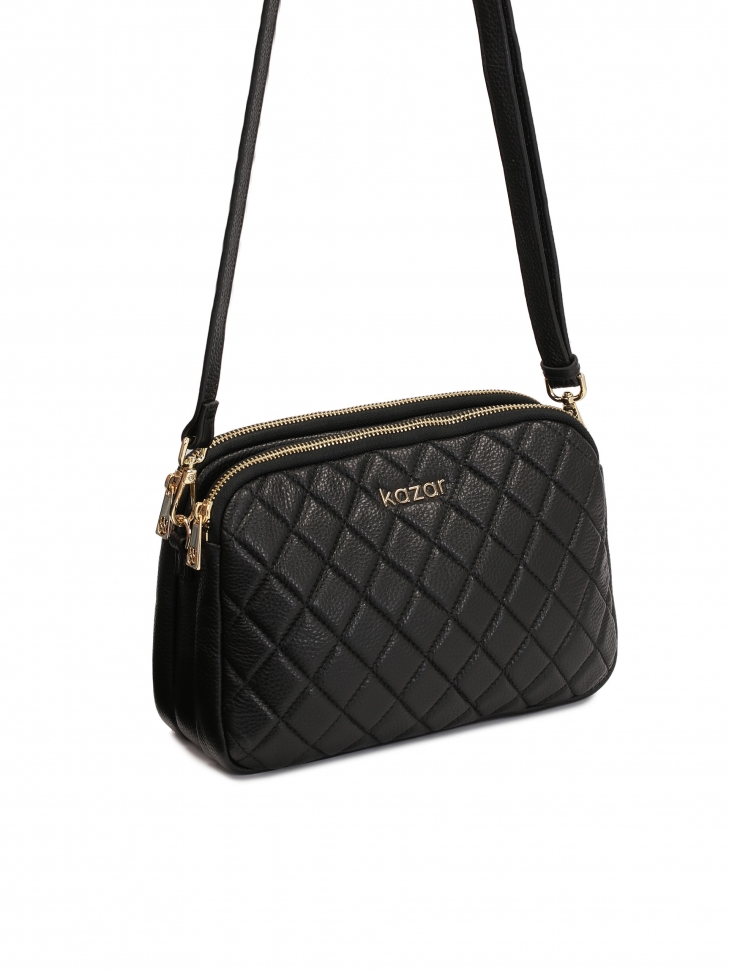 Minimalistyczna pikowana torebka z licowej skóry