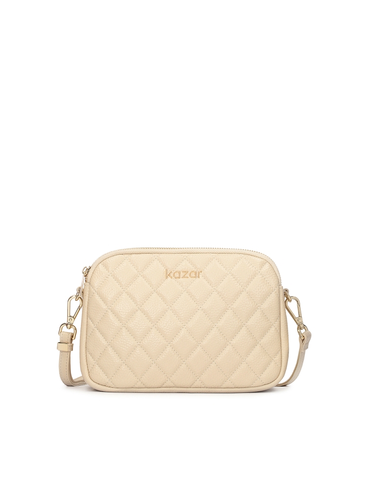 Skórzana torebka na pasku zdobiona pikowaniem