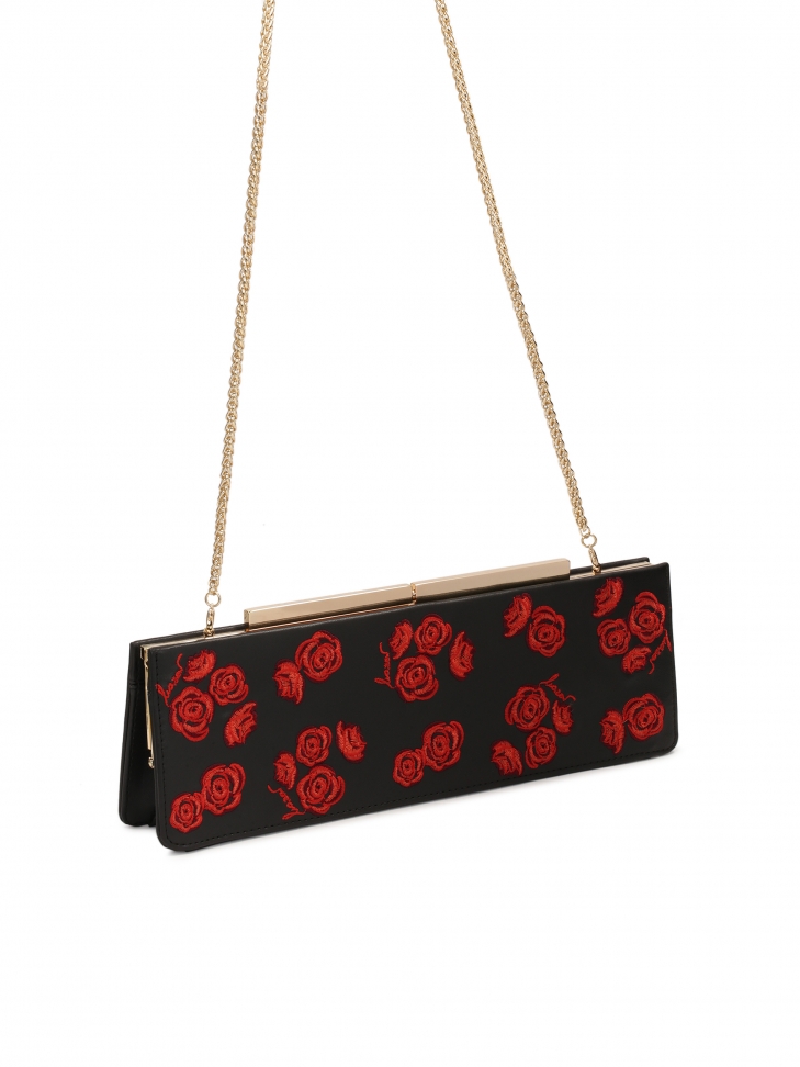 Podłużna sztywna torebka wieczorowa w kwiaty