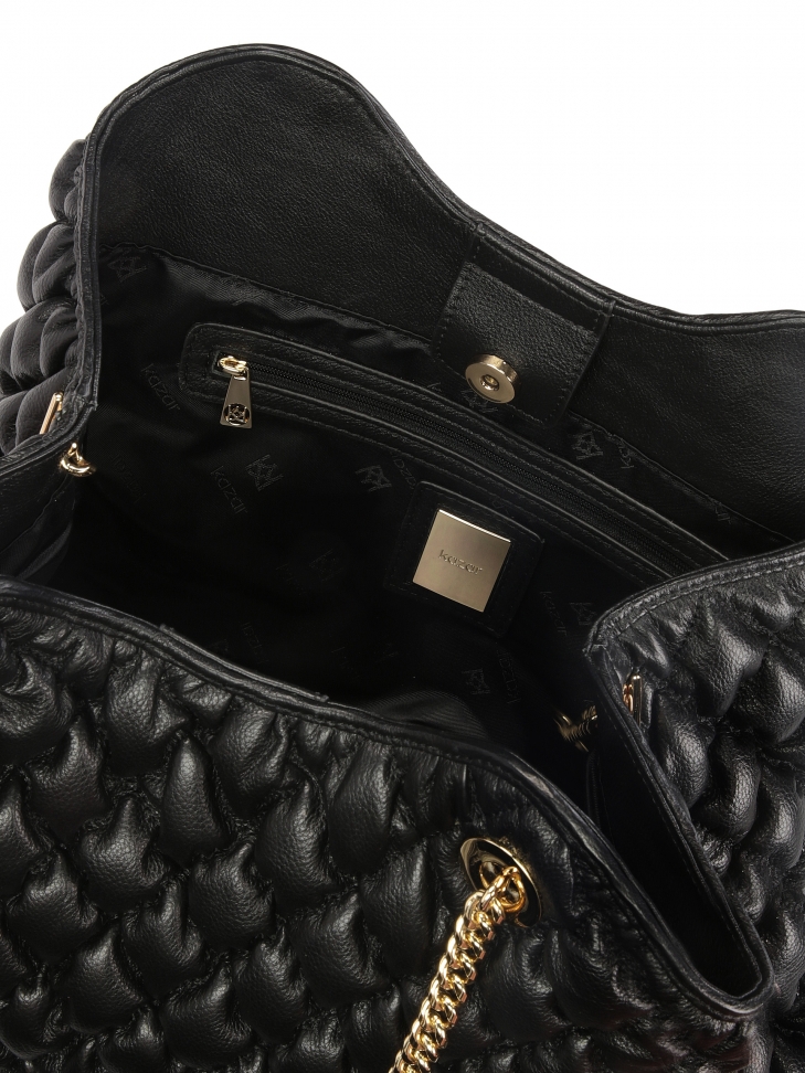 Duża pikowana torebka z uchwytami na ramię