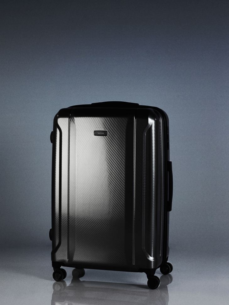 Duża luksusowa walizka w szarym kolorze