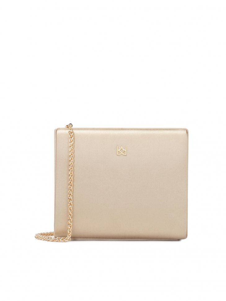 Sztywna torebka poyta beżową tkaniną