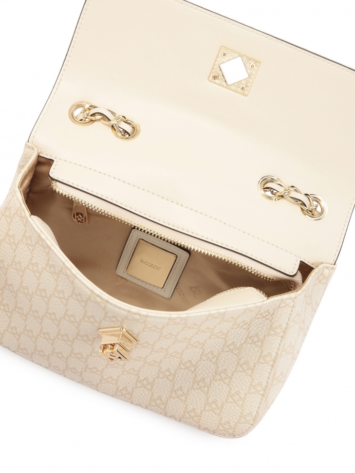 Zgrabna torebka ze skóry w beżowy print