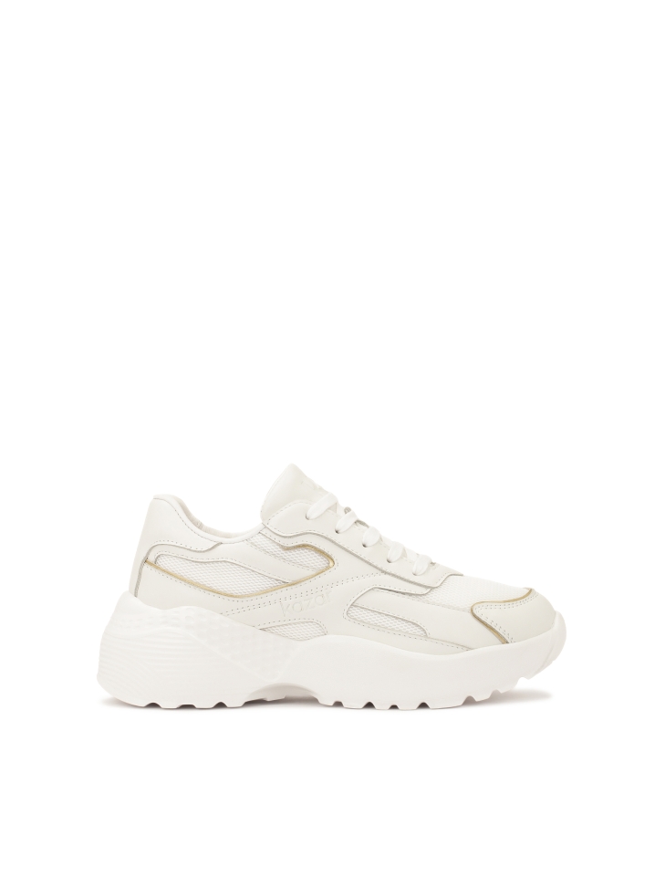 Białe sneakersy ze otą lamówką