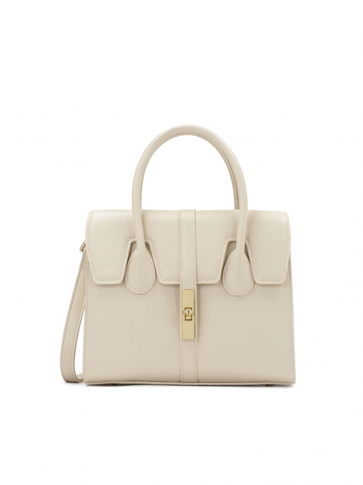 Szykowna skórzana torebka z finezyjną klapą